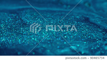 Flowing sparkles background. Glitter paint motion. Sparkling blue specks moving shot on RED Cinema camera. Flowing sparkles background. Glitter paint motion. Sparkling blue specks moving shot on RED Cinema camera. 90465734
