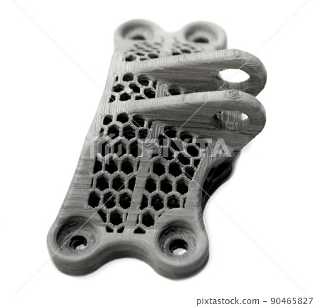 Model printed on a 3d printer made of cement concrete isolated on a white background close-up. Additive automation manufacturing 3D printing technology. Concept new modern 3d printing technologies. Model printed on a 3d printer made of cement concrete isolated on a white background close-up. Additive automation manufacturing 3D printing technology. Concept new modern 3d printing technologies. 90465827