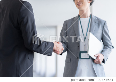 Office casual businessmen shaking hands up at hand Shooting cooperation "LINK FOREST" Office casual businessmen shaking hands up at hand Shooting cooperation "LINK FOREST" 90467624