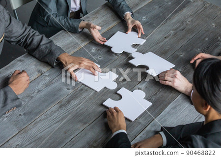 Business teamwork with puzzle 90468822