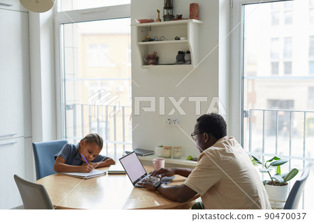 Black Father and Daughter at Home 90470037