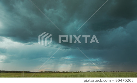 4K Sky During Rain Horizon Above Rural Wheat Landscape Field. Agricultural And Weather Forecast Concept. Storm, Thunder, thunderstorm, stormclouds, , , . Countryside Meadow In Summer Rainy Day 4K Sky During Rain Horizon Above Rural Wheat Landscape Field. Agricultural And Weather Forecast Concept. Storm, Thunder, thunderstorm, stormclouds, , , . Countryside Meadow In Summer Rainy Day 90470203