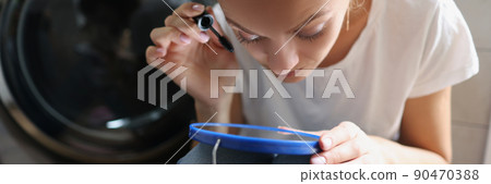 Young woman using cosmetic product Young woman using cosmetic product 90470388