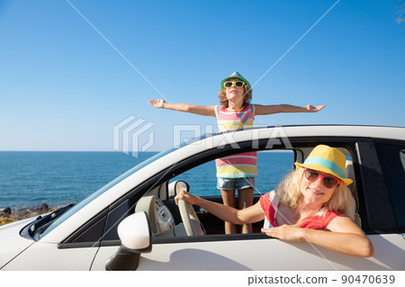 Happy family travel by car on summer vacation 90470639