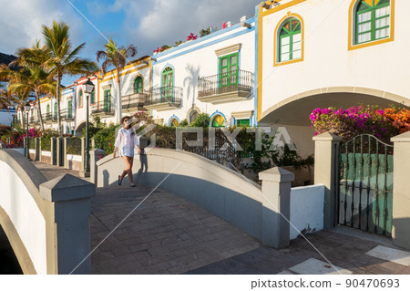 Young woman enjoying at the marina in puerto de mogan, Gran Canaria, canary islands, Spain 90470693