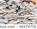 Fresh sea fish in ice on a counter in market 90470736