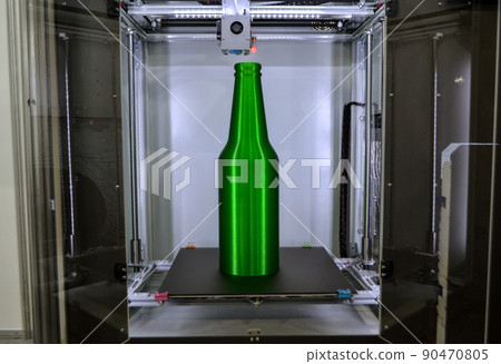 Object green bottle printed on 3D printer close-up, inside on desktop of 3d printer. Progressive modern additive technology. Concept 4.0 industrial revolution. Modern 3D printing additive technology Object green bottle printed on 3D printer close-up, inside on desktop of 3d printer. Progressive modern additive technology. Concept 4.0 industrial revolution. Modern 3D printing additive technology 90470805