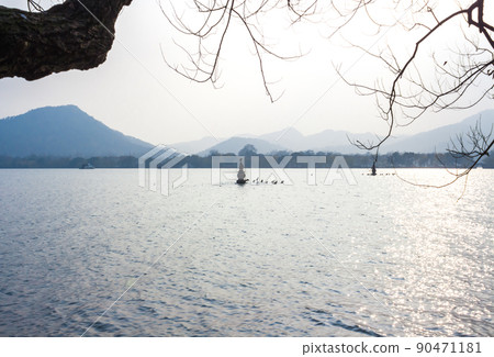 Landscape with the lake, boat, pagoda and mountains. 90471181