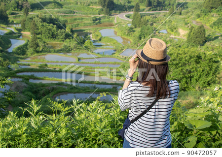 A woman traveling on the Hoshitoge in early summer, Niigata Prefecture A woman traveling on the Hoshitoge in early summer, Niigata Prefecture 90472057