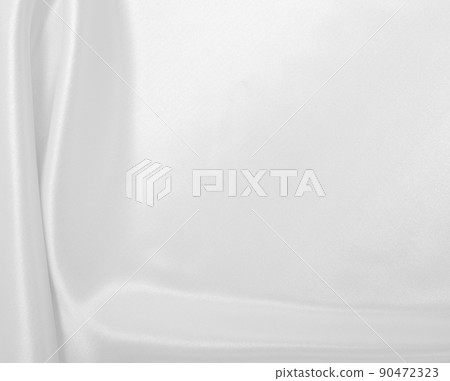 Smooth elegant white silk or satin luxury cloth texture as wedding background. Luxurious background design Smooth elegant white silk or satin luxury cloth texture as wedding background. Luxurious background design 90472323
