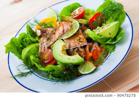Salad with fried trout, avocado, tomatoes 90478278