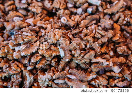Lots of shelled walnuts at the farmers market counter Lots of shelled walnuts at the farmers market counter 90478366