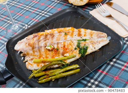 Slices of roasted sea bass 90478483