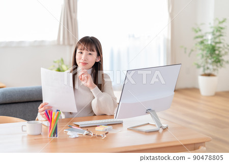 Young woman learning remotely Young woman learning remotely 90478805