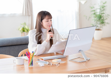Young woman learning remotely Young woman learning remotely 90478806
