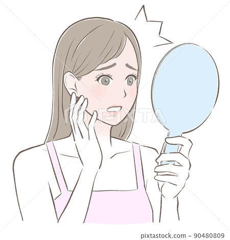 A woman shocked by a sunburn looking in a hand mirror 90480809