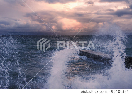 Storm at sea at sunset. Sea view with waves during rain and cloudy in Alupka. Crimea 90481395