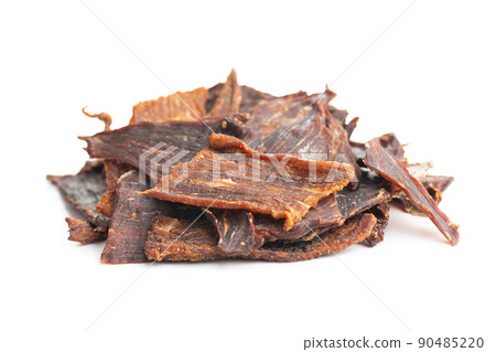 Beef jerky meat. Dried sliced meat isolated on white background. 90485220