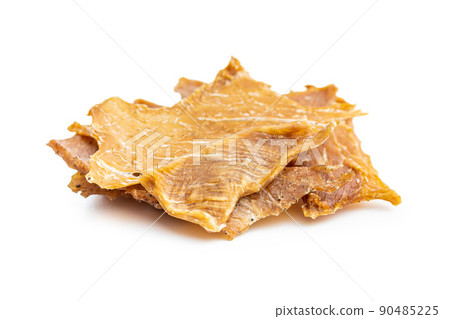 Turkey jerky meat. Dried sliced meat isolated on white background. 90485225