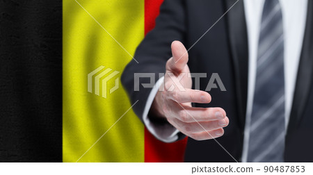 Welcome to the Belgium. Hand on Belgian flag background. Business, politics, cooperation  90487853