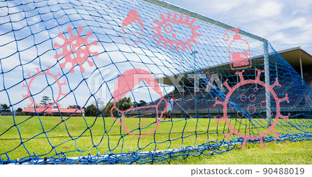 Coronavirus concept icons against man kicking soccer ball 90488019