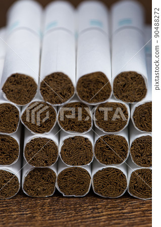Close-up of Tobacco Cigarettes Background or texture Close-up of Tobacco Cigarettes Background or texture 90488272