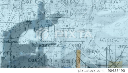 Image of mathematical equations over microscope in classroom Image of mathematical equations over microscope in classroom 90488490