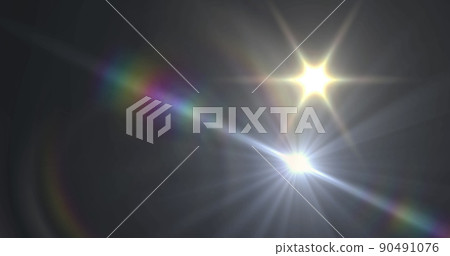 Image of white light with beam and prismatic lens flare on dark background Image of white light with beam and prismatic lens flare on dark background 90491076