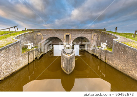 Old medieval sluice Aduarderzijl 90492678