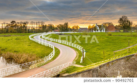 Dutch Countryside landscape with historical houses 90492701