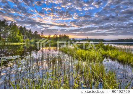 Sunset at lake Nordvattnet in Hokensas Nature reserve 90492709