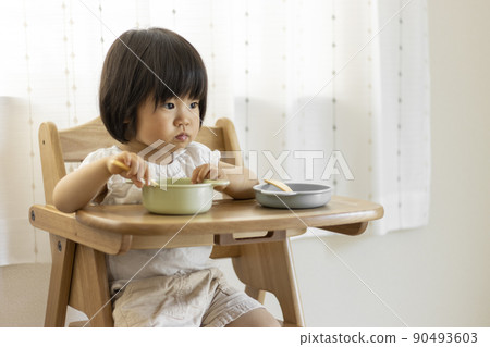 Baby sitting and eating (1 year 10 months old, girl, Japanese) Baby sitting and eating (1 year 10 months old, girl, Japanese) 90493603