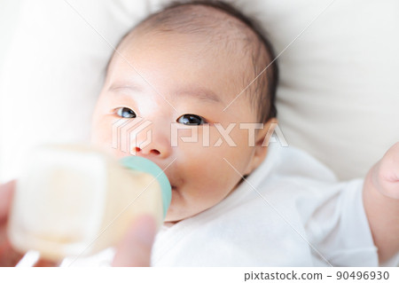 Baby drinking milk 1 month old Baby drinking milk 1 month old 90496930