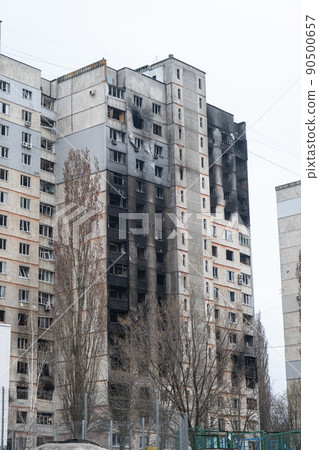 War in Ukraine 2022. Destroyed, bombed and burned residential building after Russian missiles in Kharkiv Ukraine. Russian aggression, conflict. Russian attack on Ukraine. Russia is bombing Ukraine 90500657