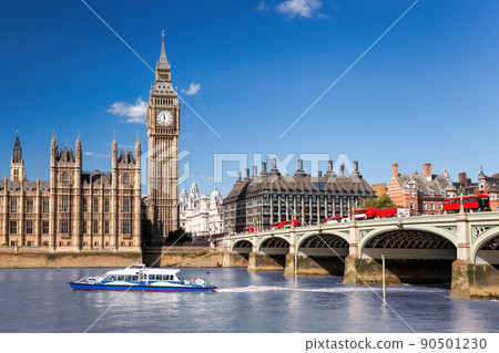 Famous Big Ben with bridge over Thames and tourboat on the river in London, England, UK 90501230