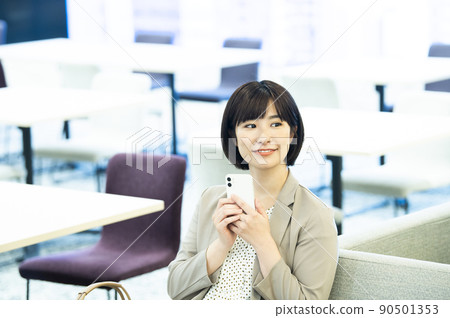 Business women office smartphone search Business women office smartphone search 90501353