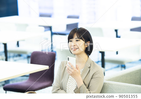 Business women office smartphone search Business women office smartphone search 90501355
