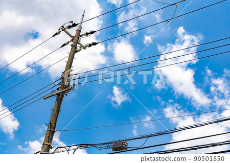 Blue sky and telegraph pole 90501850