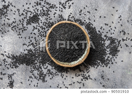 Indian spice Black cumin (nigella sativa or kalonji) seeds in bowl top view Indian spice Black cumin (nigella sativa or kalonji) seeds in bowl top view 90501910