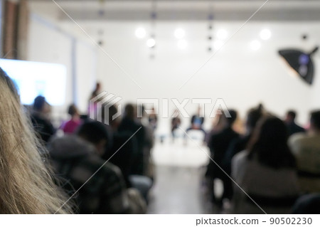 Blurred background of the business conference, a group of people on the stage, presentation of the project, public talk. High quality photo Blurred background of the business conference, a group of people on the stage, presentation of the project, public talk. High quality photo 90502230
