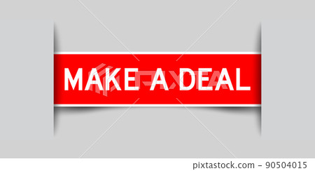Inserted red label sticker with word make a deal on gray background Inserted red label sticker with word make a deal on gray background 90504015