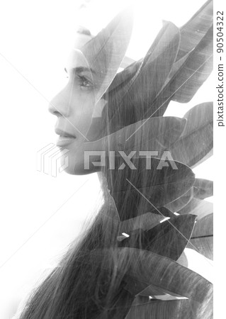 A portrait of a young woman in a classic double exposure style A portrait of a young woman in a classic double exposure style 90504322
