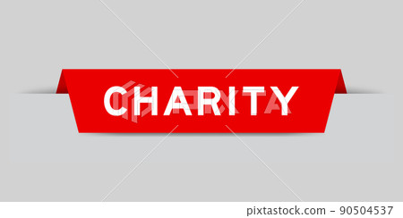 Red color inserted label with word charity on gray background 90504537