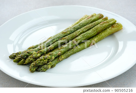Bunch of cooked asparagus 90505216