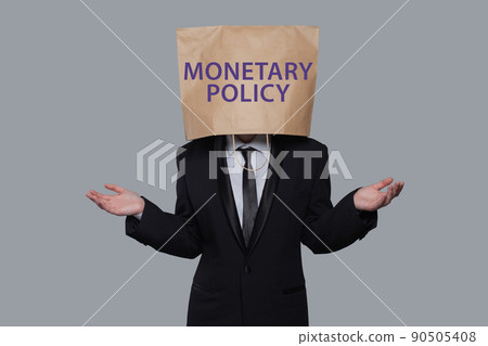 Monetary policy concept. Businessman think about monetary policy 90505408