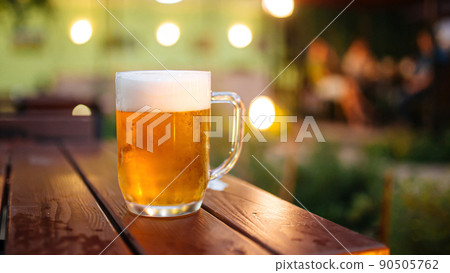 Mug of fresh light beer on the table Mug of fresh light beer on the table 90505762
