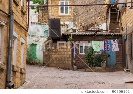 old courtyard in the historical center of Derbent, Dagestan 90506101