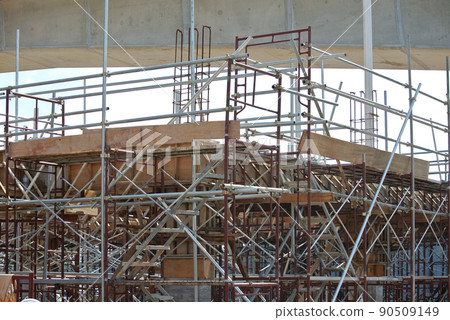 SELANGOR, MALAYSIA -FEBRUARY 11, 2015: Scaffolding used to support a platform or form work as the temporary structure at the construction site for construction workers to work.  90509149
