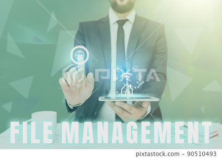 Conceptual display File Management. Word for computer program that provides user interface to manage data Man holding Screen Of Mobile Phone Showing The Futuristic Technology. 90510493