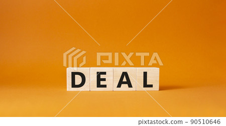 Deal symbol. Concept word Deal on wooden cubes. Beautiful orange background. Business and Deal concept. Copy space. Deal symbol. Concept word Deal on wooden cubes. Beautiful orange background. Business and Deal concept. Copy space. 90510646